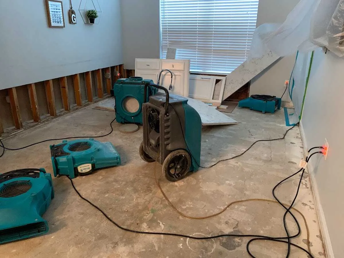 Dehumidifier in flood-cut room for Water Damage Restoration in Avon Lake